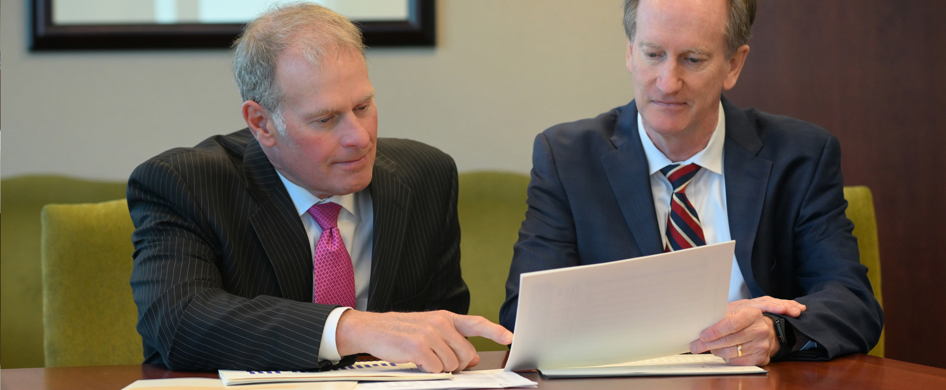 Executives meeting in conference room